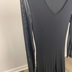 Black to ankle length long gown with long sleeves